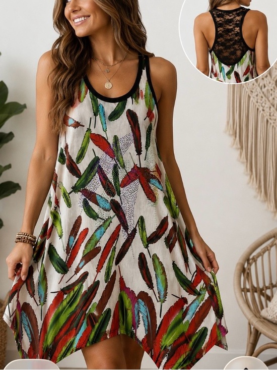 Julia Tops - Julia Feather Print Lace Back Handkerchief Hem Tunic Dress Silk Blend 
Size S/M